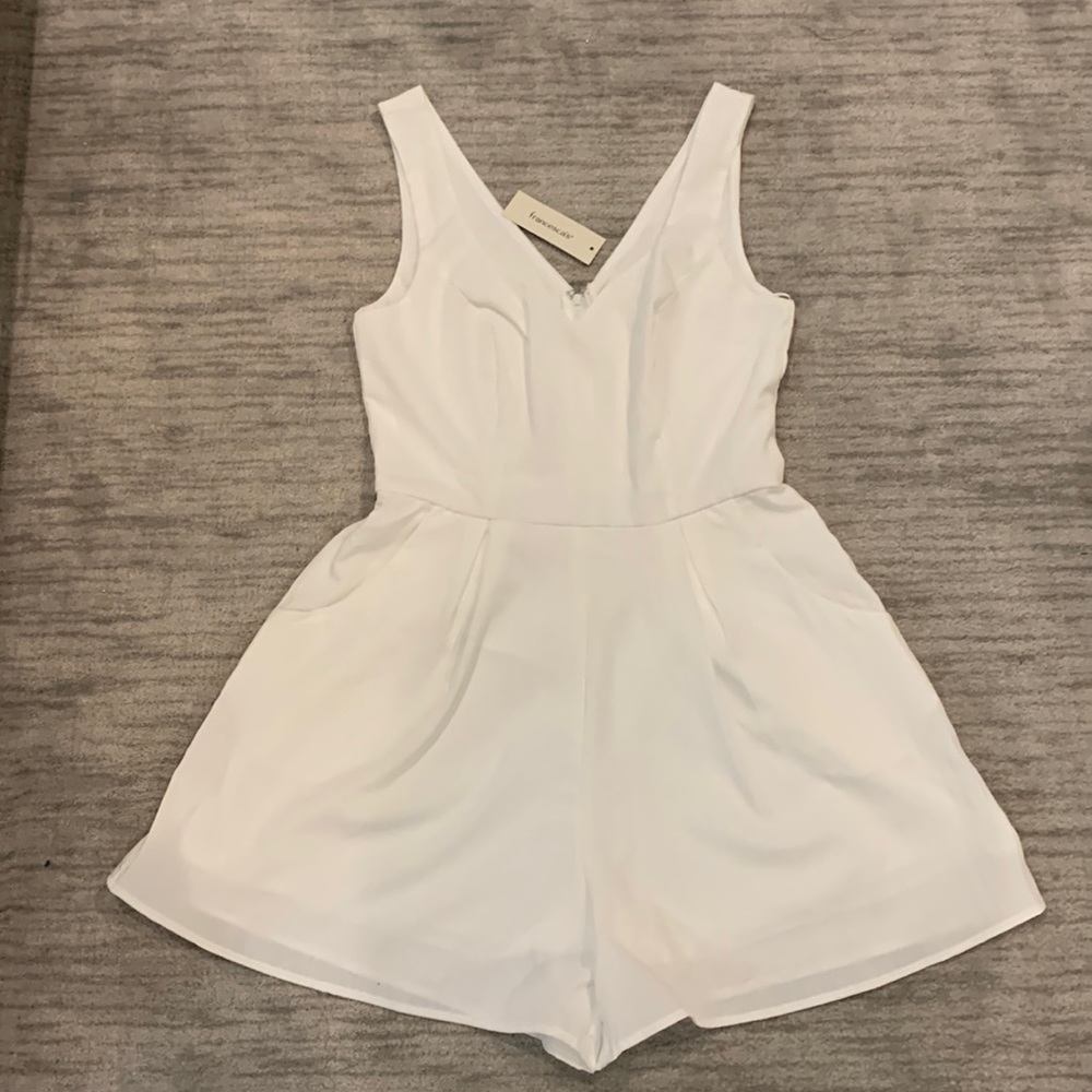 White small Brand new farncessca’s romper.